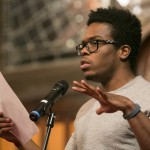 Rajah Reid, A15, performs a spoken word response at the University Chaplain's office Dr. Martin Luther King Jr. Day Community Celebration at Goddard Chapel on Jan. 22, 2015. Rajah Reid, A15, performs a spoken word response at the University Chaplain's office Dr. Martin Luther King Jr. Day Community Celebration at Goddard Chapel on Jan. 22, 2015.
