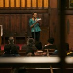 Antonia George, A17, performs a spoken word response at the University Chaplain's office Dr. Martin Luther King Jr. Day Community Celebration at Goddard Chapel on Jan. 22, 2015. Antonia George, A17, performs a spoken word response at the University Chaplain's office Dr. Martin Luther King Jr. Day Community Celebration at Goddard Chapel on Jan. 22, 2015.