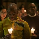 David Asamoah-Duodu, A16, pauses for a moment of silence during the candlelight vigil at the University Chaplain's office Dr. Martin Luther King Jr. Day Community Celebration at Goddard Chapel on Jan. 22, 2015. David Asamoah-Duodu, A16, pauses for a moment of silence during the candlelight vigil at the University Chaplain's office Dr. Martin Luther King Jr. Day Community Celebration at Goddard Chapel on Jan. 22, 2015.
