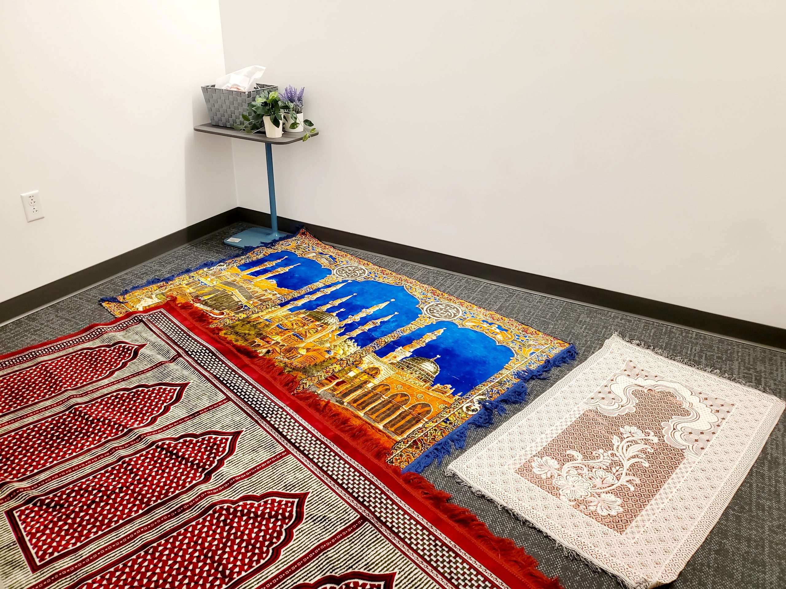 Three prayer rugs