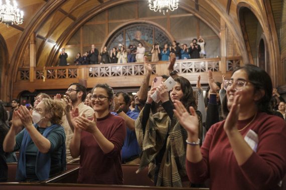 The audience clapping during the Qawwali Mehfil