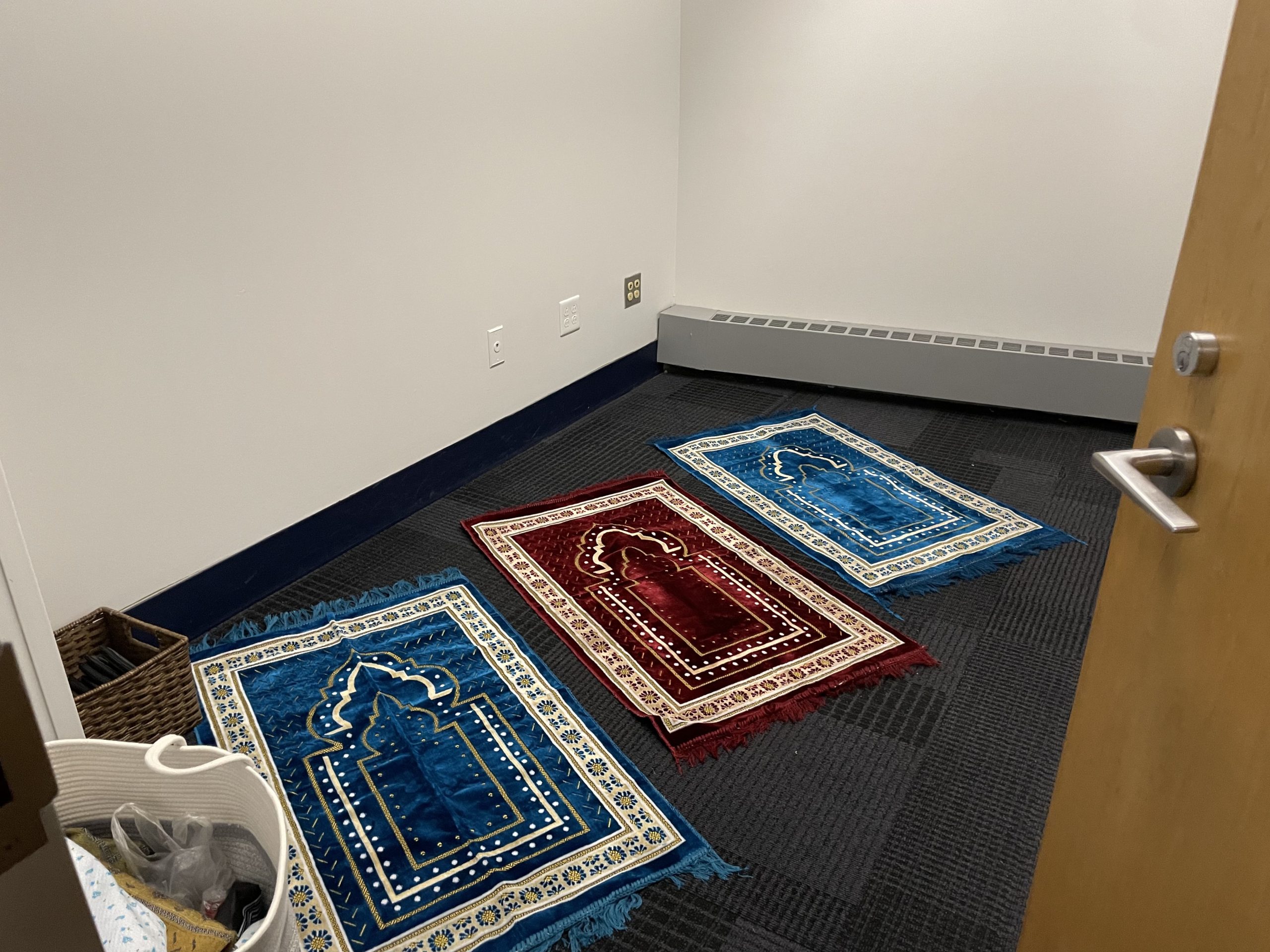 3 prayer rugs in a small room